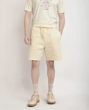 Rare Rabbit Men Enox Pastel Yellow Cotton Elastane Fabric Plain Shorts